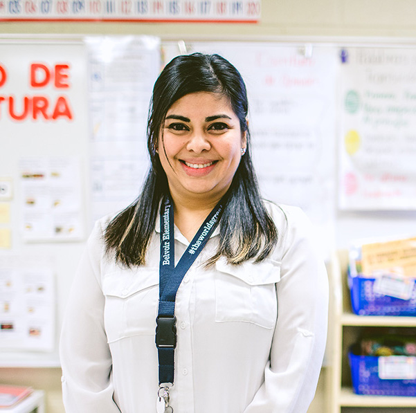 An Ambassador Teacher smiling after accepting an international teaching position