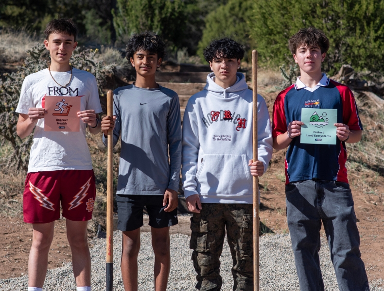 Four students at a Global Leaders middle school exploring local issues for career readiness