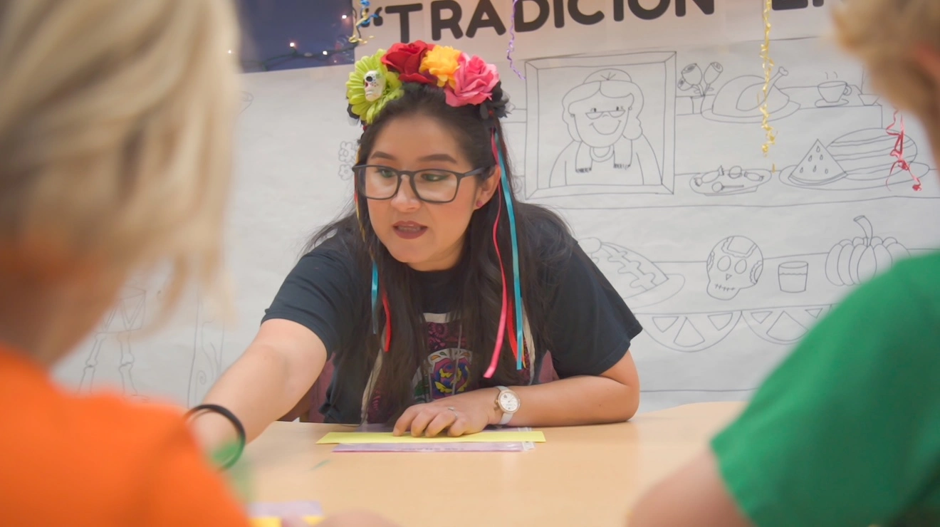 Teacher from Mexico leads a classroom activity celebrating cultural traditions, engaging students during a Participate Learning exchange program lesson.