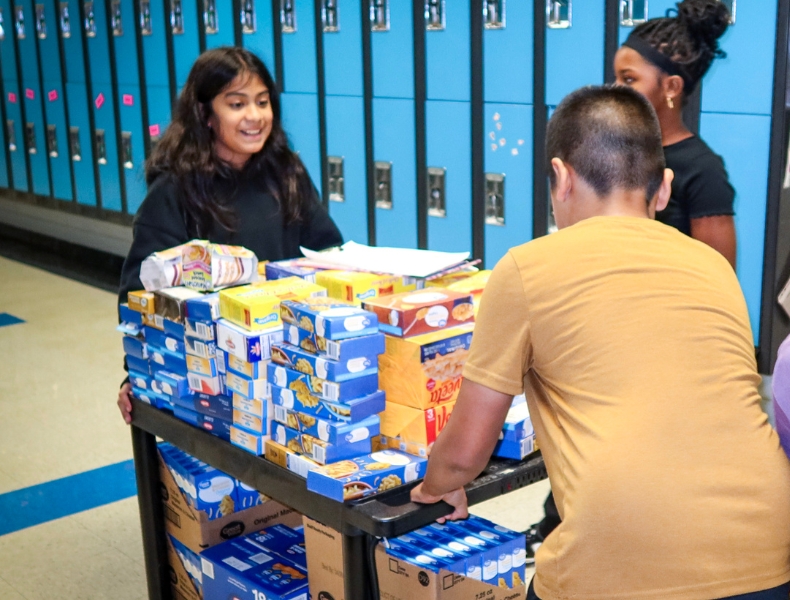 Students helping with a school food drive